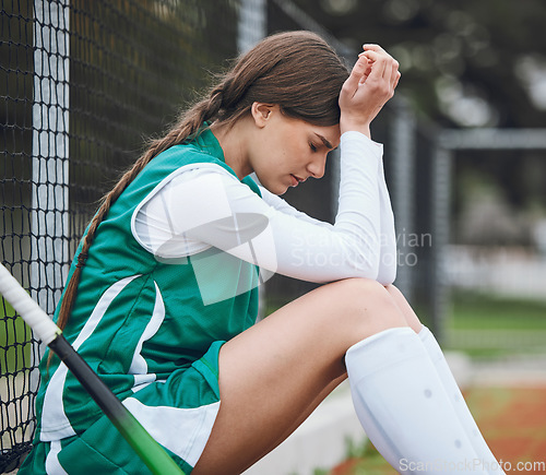 Image of Sad, woman and athlete fail in sports, game or performance and frustrated with stress or anxiety in competition. Match, loser and person angry with field hockey, fitness or upset with mistake