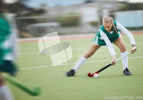 Image of Hockey, athlete and woman running in game, tournament or competition with ball, stick and action on artificial grass. Sports, training and women play in exercise, workout or motion on the ground