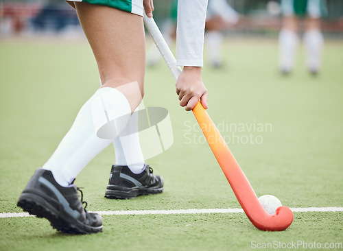 Image of Woman athlete, hockey and field for game goal training or running, workout on grass turf. Professional sports person, fitness competition or strong cardio health, challenge in physical performance