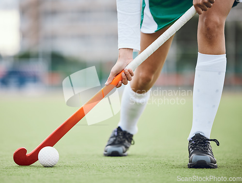 Image of Woman athlete, hockey and field with exercise for game goal training or running, workout on grass turf. Feet of sports person, fitness competition or strong cardio health, challenge in fast play