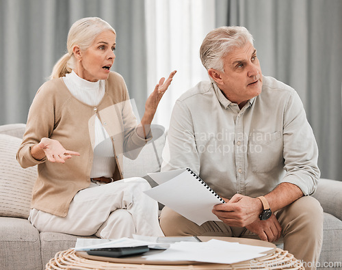 Image of Bills, old couple with documents and stress in home, mortgage payment and retirement funding crisis. Financial budget, senior man and woman on sofa with anxiety for debt, life insurance and taxes.