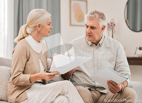 Image of Life insurance, old couple with documents and stress in home, mortgage payment and retirement funding crisis. Financial budget, senior man and woman on sofa with anxiety for bills, debt and taxes.