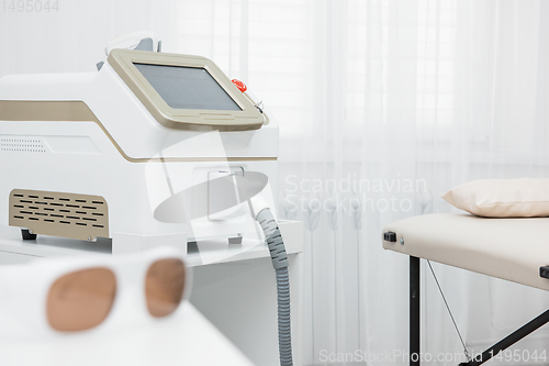 Image of Room in spa center with laser epilation equipment