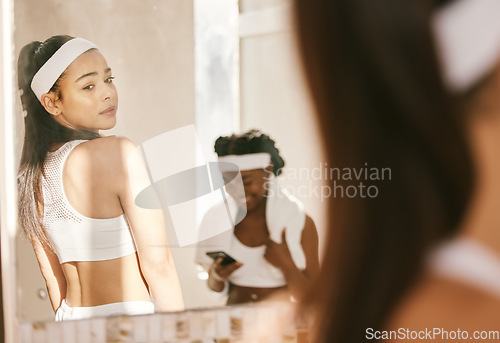 Image of Women, mirror and gym in sportswear, body image issue and thinking of health, wellness and fitness. Sports club, workout partner and exercising for tennis competition, comparison and insecure thought