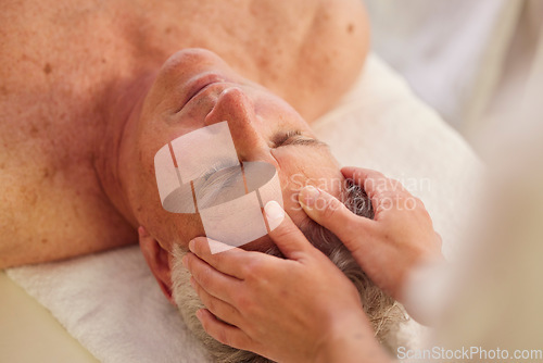 Image of Relax, head massage and senior man at a spa for luxury, self care and muscle healing treatment. Health, wellness and elderly male person on a retirement retreat for face therapy at a natural salon.