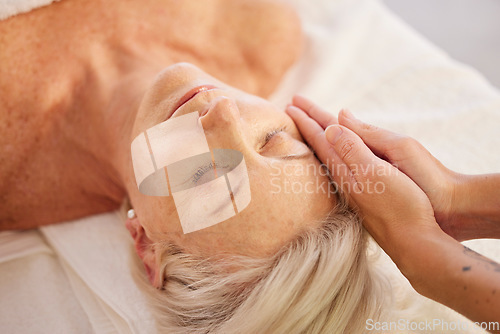 Image of Relax, face massage and senior woman at a spa for luxury, self care and facial healing treatment. Health, wellness and elderly female person on a retirement retreat for head therapy at natural salon.