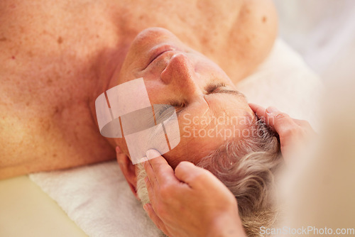 Image of Spa, head massage and senior man for luxury, self care and muscle healing treatment for relaxation. Health, wellness and elderly male person on a retirement retreat for face therapy at natural salon.