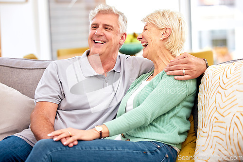 Image of Funny, laughing or happy senior couple with love, care or joy together on sofa at home in retirement. Relax, silly joke or mature people hug with support, humor or loyalty on house living room couch