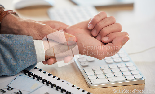 Image of Hands, office or businessman with wrist pain while working on a computer workplace with arthritis or injury. Hurt hand, carpal tunnel emergency or closeup of injured worker with discomfort arm cramp