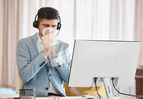 Image of Consultant, sick or man blowing nose in call center telecom office with hay fever sneezing or illness. Cold, contact us or sales agent with toilet paper tissue, allergy virus or flu disease at work