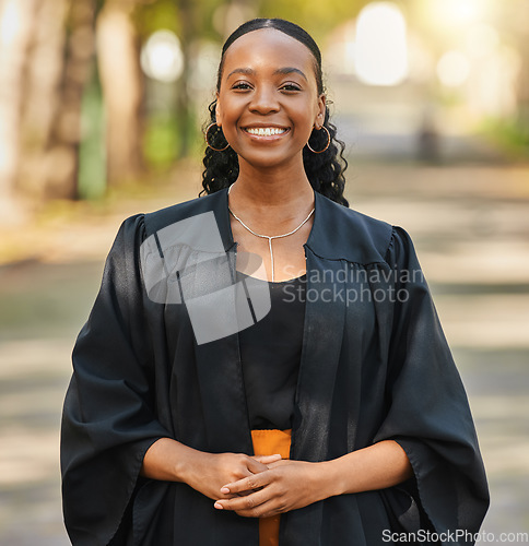 Image of Portrait, graduate and happy black woman at university at campus outdoor. Face, graduation and smile of confident African student at college for education achievement, learning and success in Nigeria