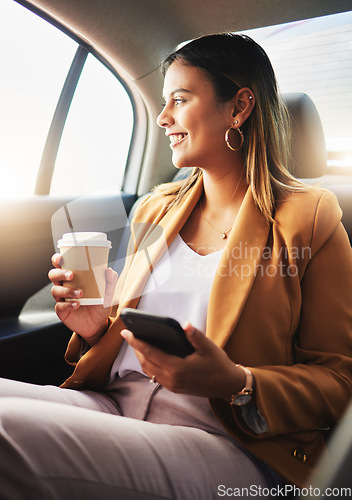 Image of Businesswoman, phone and coffee in car for travel to work with smile in happiness, alone and profile. Young, person and employee with commute to office in taxi, backseat and sitting to look at street