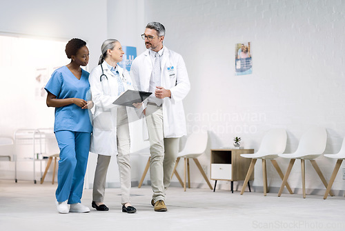 Image of Checklist, team of doctors and nurse in discussion, planning and walking in hospital. Group of medical workers on clipboard, paperwork chart and people in meeting for healthcare of student and mentor