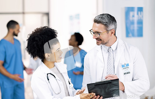 Image of Doctors, people and checklist for teamwork, medical results and mentor planning or talking of hospital or clinic. Healthcare worker, student or nurse with manager writing for notes or charts