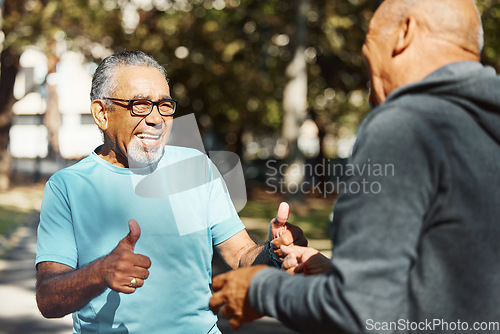Image of Fitness, friends and old men in park with thumbs up, smile and motivation on morning exercise together. Yes, energy and agreement, senior people in nature for workout, training and happy retirement