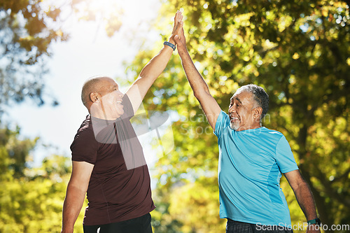 Image of Senior man, friends and high five in nature for fitness, workout or outdoor exercise together. Happy mature people touching hands in success, teamwork or motivation for training or wellness in nature