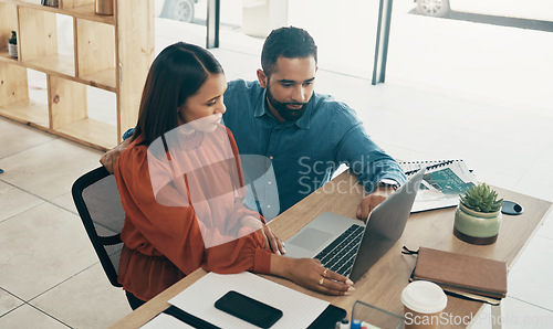 Image of Research, business couple in home office and working together for planning startup online. Coworking on website, man and woman at desk with laptop, support and mentor on project at digital agency.