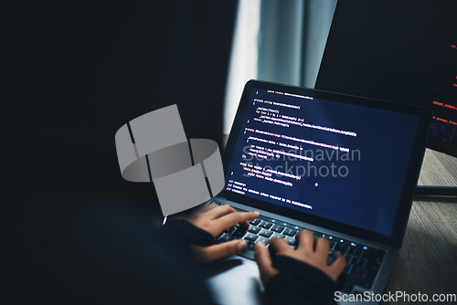 Image of Person, hands and hacker on laptop at night in cybersecurity, coding malware or software at home. Hacking, working late and typing on computer in programming, algorithm or cyber attack in house