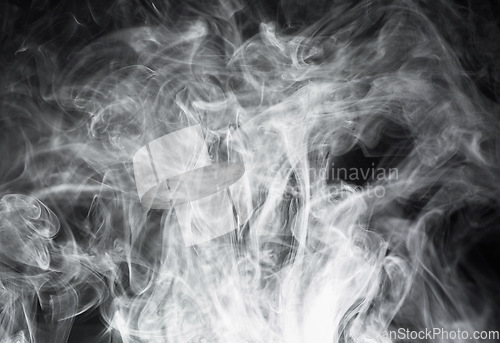 Image of Smoke, steam or gas in a studio with dark background by mockup space for magic effect with abstract. Incense, fog or vapor mist moving in air for cloud smog pattern by black backdrop with mock up