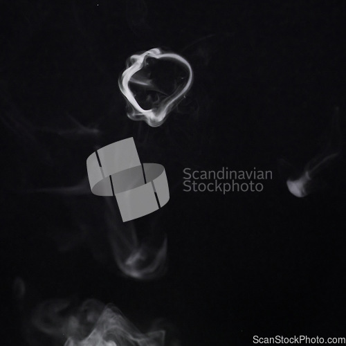 Image of Smoke, fog or pollution with incense on dark background, gas or mist with vapor and mockup space in studio. Dry ice, pattern and texture with energy, steam and air with black backdrop and smog