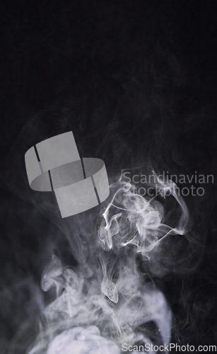 Image of Smoke, dark background and mist, fog or gas on mockup space wallpaper. Cloud, smog and magic effect on black backdrop of steam with abstract texture, dry ice pattern or vapor of incense moving in air