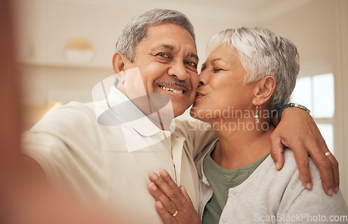 Image of Selfie, kiss and old couple in home with love, support or portrait of marriage in retirement together. Digital photography, smile on face of happy man and old woman in apartment for social media post