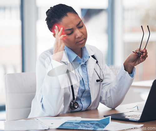 Image of Woman, doctor or headache at desk or medicine burnout at hospital, mental health stress or tired. African female professional, fatigue or pain and working with brain fog depression, vertigo or sick