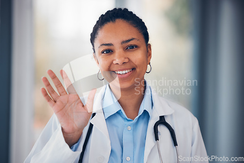 Image of Happy woman, portrait and doctor wave hello for meeting, greeting or Telehealth at friendly hospital. Female person, nurse or professional surgeon smile for medical introduction or visit at clinic