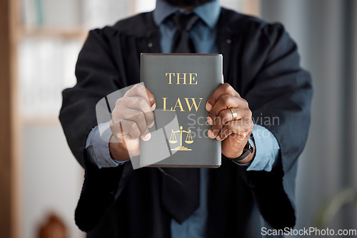 Image of Hands, judge and law book for justice, knowledge and study constitution for decision in court. Legal expert, attorney or advocate and choice for equality, consultation and compliance for government