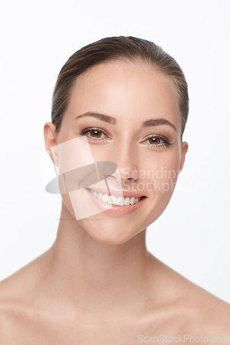 Image of Woman, smile and studio portrait for beauty or cosmetic results, glow or makeup routine. Female model, face and nude wellness natural look for happiness, white background or clean skin dermatology