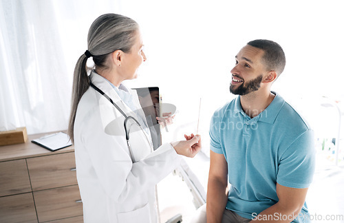 Image of Doctor, patient and consultation at hospital for checkup, results or healthcare diagnosis on bed. Medical woman or surgeon consulting man, customer or client for appointment, visit or test at clinic