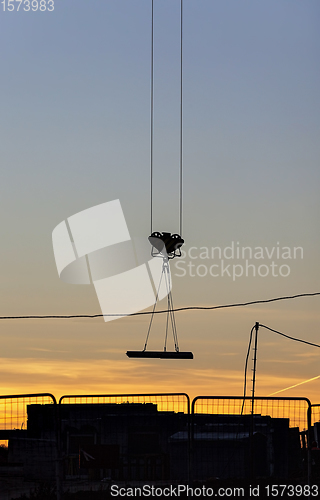 Image of tall yellow construction crane