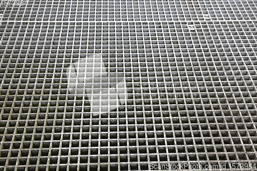 Image of metal grating for the movement