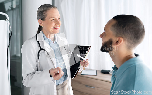 Image of Woman doctor, medical consultation and tablet at hospital with patient discussion and surgery info. Wellness advice, technology and mature female professional with healthcare, consulting and talking