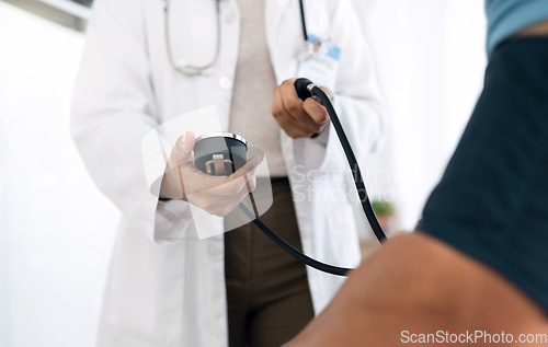 Image of Clinic hands, people and doctor hypertension test for medical exam, assessment or health consultation. Closeup surgeon, professional nurse or monitor blood pressure, pulse or reading sphygmomanometer