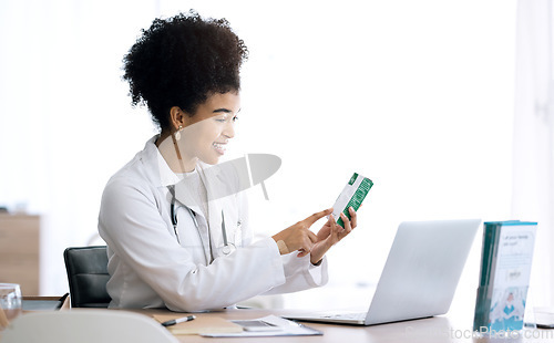 Image of Woman, doctor and laptop for video call, pills and advice with telehealth, product or package in clinic office. Medic, nurse or pharmacist with box, drugs and happy for consultation with computer