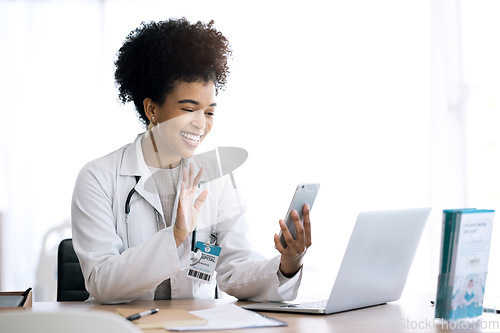 Image of Doctor, woman and video call or phone communication in healthcare, social media or telehealth service at office. Happy african person or medical worker wave hello or talking on mobile voip for advice