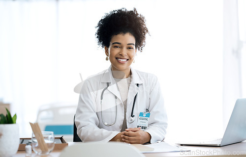 Image of Professional, office and portrait of woman doctor at medical administration desk for medicine information and working. Confident, healthcare and happy worker with smile at surgeon table for insurance