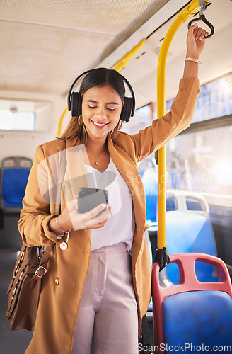 Image of Woman in bus with smile, phone and headphones, travel on urban commute and streaming podcast on drive. Public transport, service and happy girl listening to music on cellphone for radio on mobile app