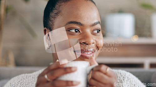 Image of Black woman, happiness and peace, thinking with coffee in hands and relax at home, future and mindfulness. Smile, warm drink and dream, inspiration and self care with calm in living room and tea