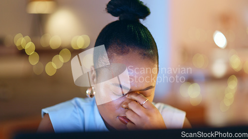 Image of Stress, headache and deadline with a business black woman in her office at night for overtime work. Depression, fail or mistake with a frustrated or annoyed professional employee in the workplace