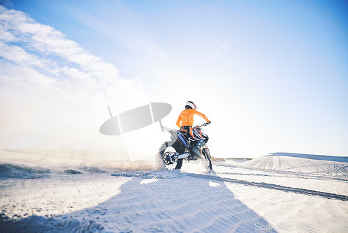 Image of Desert, back and man on motorbike outdoor to race, adventure or travel for extreme sport on mockup space. Off road, sand and driver on motorcycle on dirt in nature for action, competition and freedom