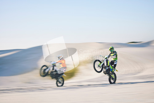 Image of Speed, desert and people for cycling on a motorbike for travel, sports or freedom. Moving, fast and racers on bikes for adrenaline, challenge or driving on a sand course for adventure or competition
