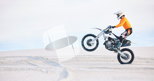 Image of Motorbike, person and sports with fitness, training and challenge with safety, desert and energy. Athlete, sand and biker with mockup, practice and cycling with exercise, travelling and adventure