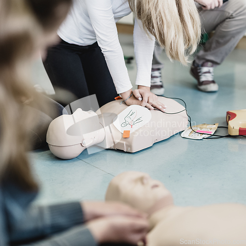 Image of First aid resuscitation course using AED.