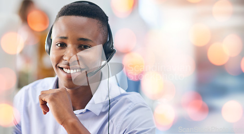 Image of Customer service, portrait and man in office with bokeh for crm telemarketing consultation. Mockup space, contact us and professional young African male call center agent with headset in workplace.