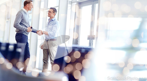 Image of Business people, handshake and partnership, welcome or negotiation success of deal, agreement or job onboarding. Professional clients shaking hands for meeting introduction in bokeh office or mockup