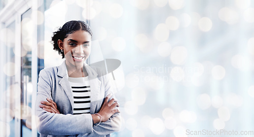 Image of Black woman, arms crossed and portrait with a smile from business consultant work with mockup space. Confidence, female entrepreneur and professional from New York happy from startup by window bokeh