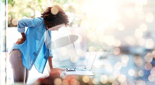 Image of Laptop, backache and posture with a business woman holding her spine in pain at the office for work. Computer, space and a young design employee feeling an injury to her body on double exposure