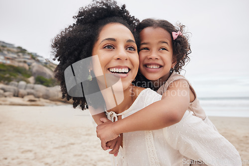 Image of Beach, piggyback or happy mother with child in nature to enjoy a family holiday vacation in New Zealand. Travel, hug or proud mom at sea or ocean with smile, kid or girl to relax or bond together